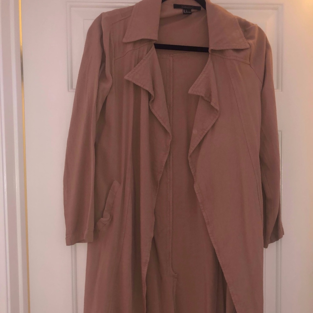 Tan long trench coat.